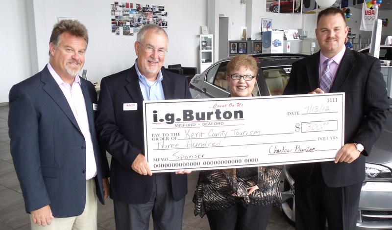 I.g. Burton Mercedes Benz/BMW of Milford presented a sponsor check to Kent County Tourism. Shown are (l-r) Pete Renzi, director of operations; George Schifferer, director of service and parts; Lorraine Dion, director of special events and public relations for Kent County Tourism; and M.J. Lofland, director of sales and finance. SOURCE SUBMITTED